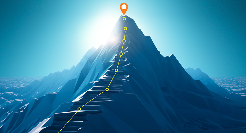 An image of a mountain depicting the steps that are taken towards Prioritizing Capital Projects. The peak represents the journey towards achieving business objectives.